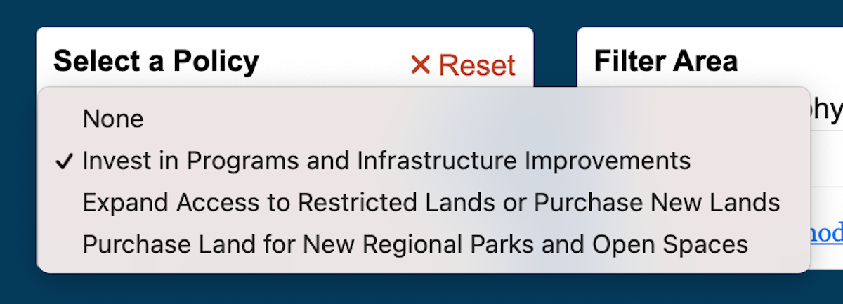 Policy menu open showing three policy options, Invest in Programs and Infrastructure Improvements, Expand Access to Restricted Lands or Purchase New Lands, Purchase Land for New Regional Parks and Open Spaces